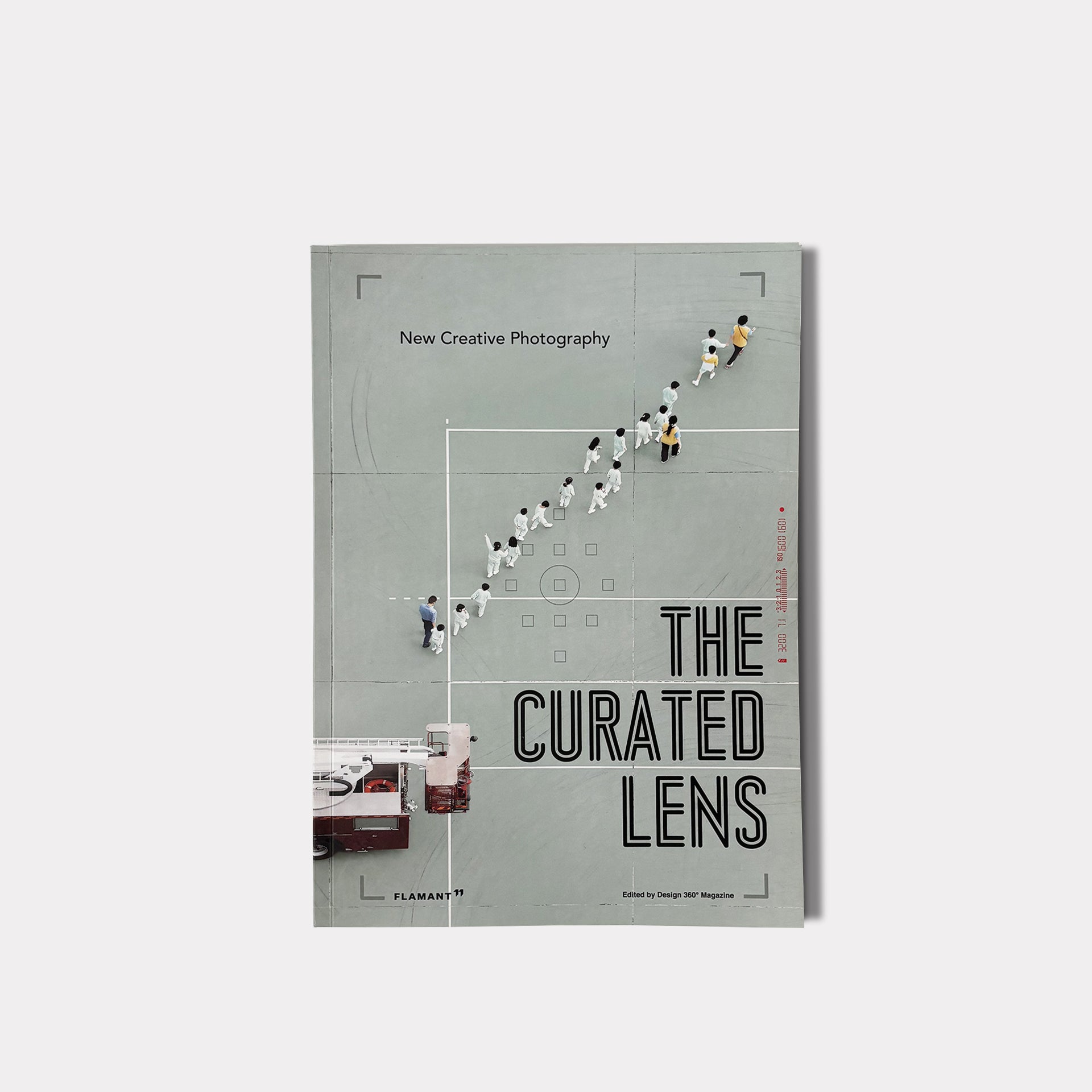 Book cover of 'The Curated Lens' with people walking